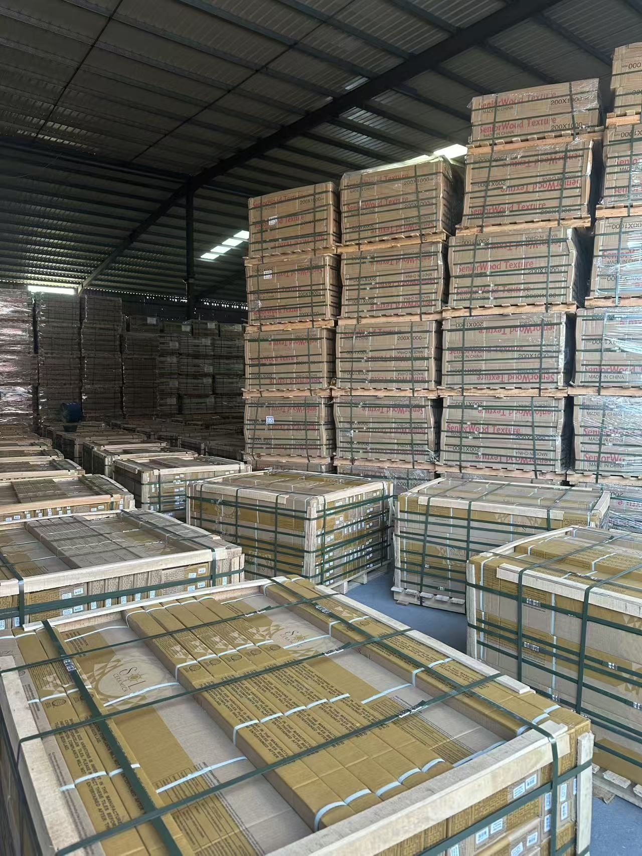 Packed YiRong tile products prepared on pallets