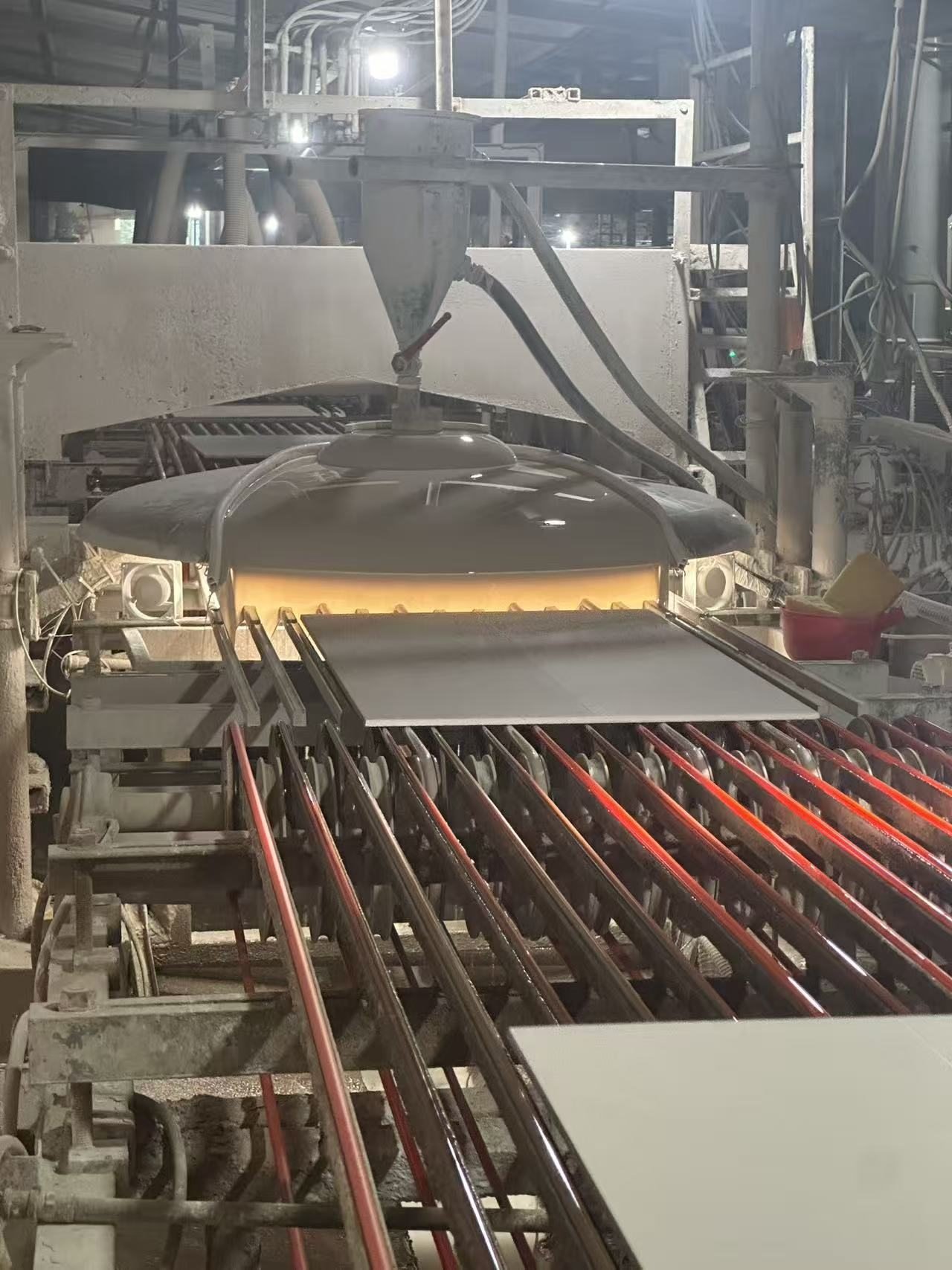 Wood-look tile moving through a YiRong production stage